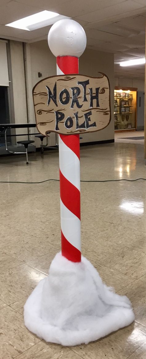 North Pole sign Christmas Theatre Decoration, Pictures With Santa Display Ideas, Christmas Park Decor Ideas, Christmas Pole Decorations, Dealership Christmas Decorations, Diy Northpole Sign, Santa’s Workshop Christmas Decorations, May Pole Craft, Santa's Home North Pole