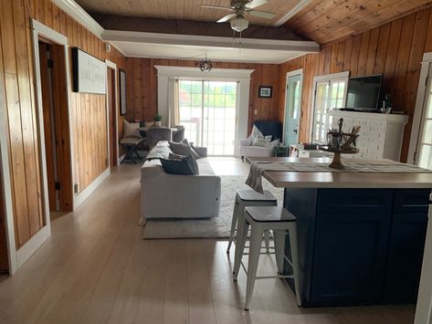 We wanted to keep the rustic charm with the knotty pine walls. Gave it a fresh look with white trim and crown molding. Knotty Pine Walls Color Schemes, Knotty Pine Living Room, Knotty Pine Decor, Knotty Pine Rooms, Pine Paneling, Knotty Pine Walls, Paneling Makeover, Cabin Renovation, Log Home Interiors