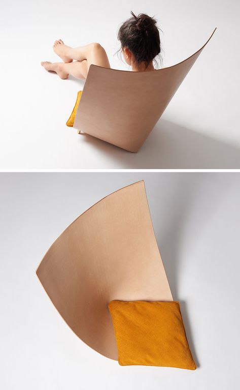 Jordi Ribaudí has designed a modern and sculptural chair, that's made from a single leather piece that backs back on itself to create the backrest, while small brass feet keep the structure together. #Design #Furniture #Chair #Seat #Leather Japanese Chair Design, Small Leather Chairs, Modern Chair Design, Modern Leather Chair, Unique Chairs Design, Sculptural Chair, Chair Design Modern, Low Chair, Leather And Brass