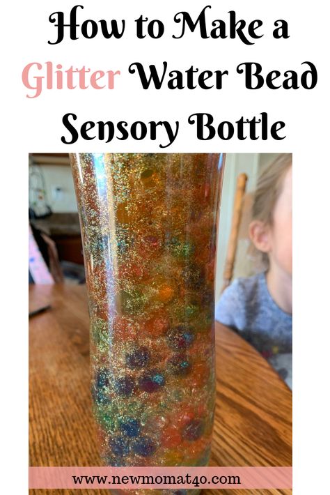 How to Make a Glitter Water Bead Sensory Bottle #sensorybottle #glittersensorybottle #glitterbottle #waterbead #kidscraft Water Bead Sensory Bottle, Glitter Sensory Bottles, Glitter Bottles, Frugal Homemaking, Discovery Bottles, Bottles Diy, Glitter Water, Sensory Bottle, Holiday Activities For Kids