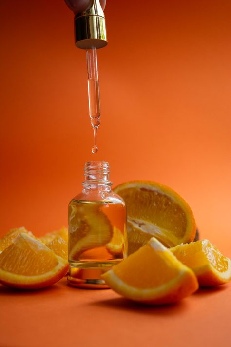 Beauty Oil Photography, Orange Skincare Aesthetic, Essential Oil Product Photography, Essential Oils Photography, Essential Oil Photography, Orange Skincare, Orange Cosmetic, Oil Photography, Skin Care Pictures