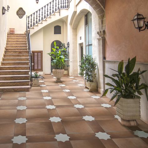 Replicating a terra cotta look, our Argile Porcelain Floor and Wall Tile Kit features tiles with mixed textured finishes, providing decorative appeal that adapts to a variety of stylistic contexts. Mexican Tile House, Front Porch Flooring Ideas, Branding Deck, Spanish Backyard, Tiled Patio, Spanish Floor Tiles, Mexican Tile Floor, Cottage Core House, Saltillo Tile