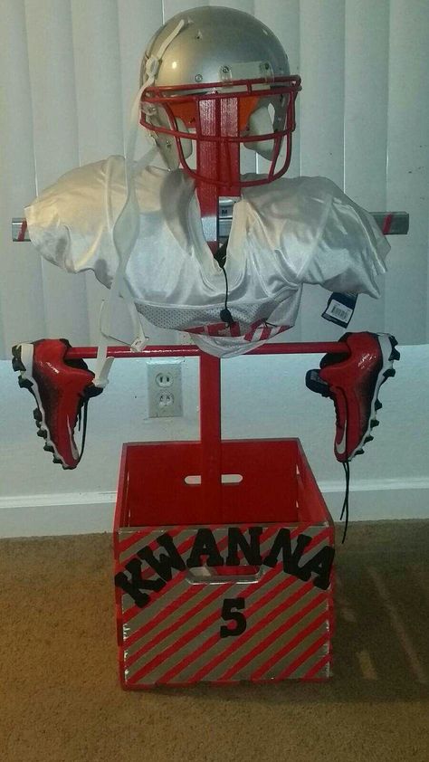 I gave my husband an idea and he ran with it! This is a football equipment stand so my son stuff can air out AND be easy to find ❤❤ Football Gear Organization, Football Gear Stand Diy, Football Equipment Storage, Football Gear Storage, Football Storage, Football Shoulder Pad, Gear Stand, Sports Equipment Organization, Football Pads