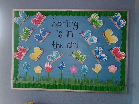 May Boards For Preschool, April Pre K Crafts, April Toddler Bulletin Board, May Window Display Ideas Preschool, Spring Time Bulletin Board Ideas Preschool, Infant Room Art Projects, Spring Bulletin Boards Infants, Spring Classroom Board Ideas, April Preschool Crafts Spring