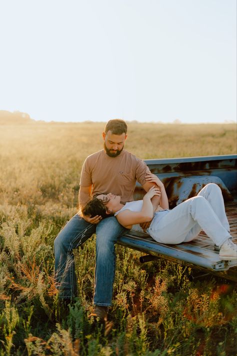 1965 Ford F100 - Couple Photoshoot - Photoshoot Outfits - Couple Poses - Photoshoot in Field - Vintage Inspired Photoshoot - Photography Poses - #fashion #photooftheday #photoshoot #coupleportrait #outfitideas Couples Photoshoot Bench, Truck Picnic Photoshoot, Couple And Truck Photography, Couples Pics With Truck, Farm Truck Photography, Pickup Truck Photoshoot Couple, Truck Bed Photoshoot Family, Backroad Couple Photoshoot, Old Truck Photo Shoot Couple