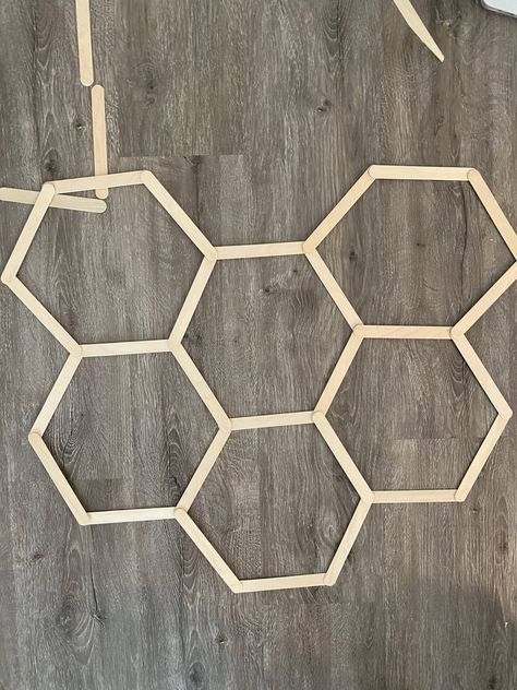 First Bee Day Party Backdrop, Diy Honey Comb Decoration, Sweet As Can Bee Balloon Garland, Honey Comb Crafts, Honeycomb Backdrop Diy, Popsicle Stick Honeycomb Diy, Honeycomb Decor Diy, Honeycomb Balloon Garland, Honeycomb Popsicle Stick Diy