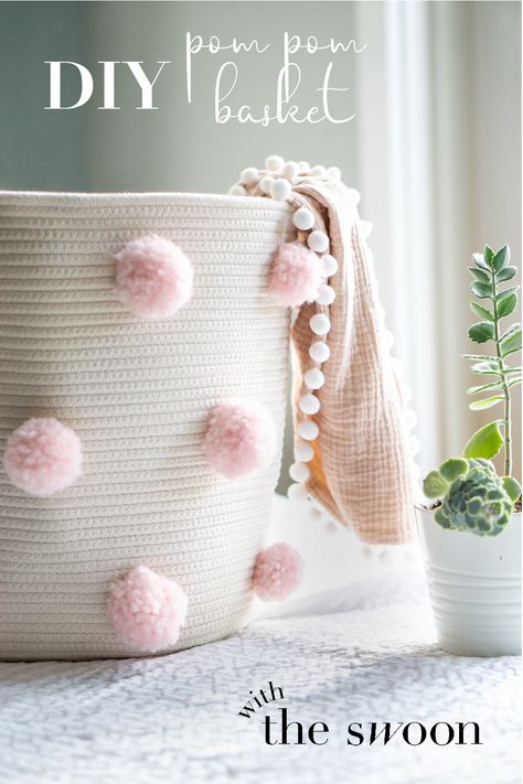 Make your own adorable pom pom storage rope basket to liven up baby's nursery! In just 3 easy steps you'll learn how to make this fun storage basket. A simple nursery storage idea. #diy #diynursery #DIYbaby Pom Pom Basket, Stair Basket, Clover Pom Pom Maker, Diy Baby Blanket, Diy Pom Poms, Simple Nursery, Yarn Hanging, Storage Idea, Diy Pom Pom