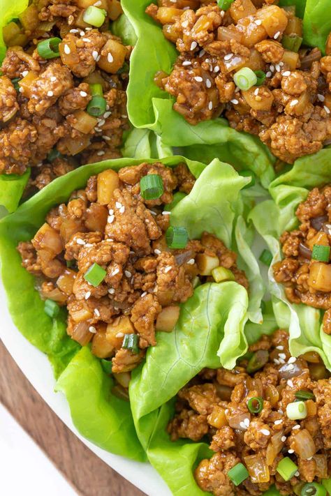 These delicious Asian-inspired chicken lettuce wraps are so much better than P.F. Chang's and are prepared in under 25 minutes. Changs Chicken Lettuce Wraps, Pf Changs Chicken Lettuce Wraps, P F Chang, Asian Chicken Lettuce Wraps, Asian Lettuce Wraps, Pf Changs, Lettuce Wrap, Chicken Lettuce Wraps, Asian Chicken