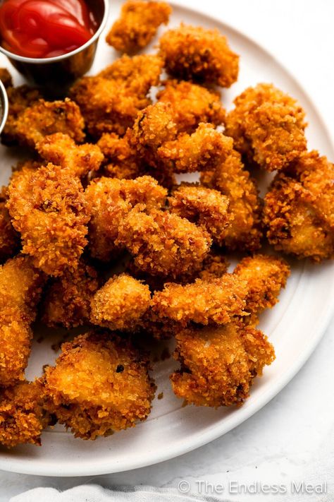 These tender bites of popcorn chicken are coated in smoky chipotle flavor and then crusted in panko crumbs before being fried to crispy perfection. Serve them with a simple honey mayo sauce on the side for dipping and everyone from your kids to your party guests will love these! #theendlessmeal #appetizer #partyfood #chickenrecipes #littlebites #chicken Panko Chicken Tenders, Fried Chicken Bites, Crumbed Chicken, Bread Crumb Chicken, Chicken Crisps, Popcorn Chicken Recipe, Air Fryer Recipes Dessert, New Chicken Recipes, Chicken And Chips