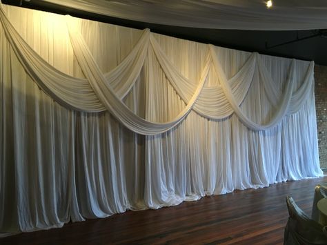 Fabric Wall Draping, Chiffon Wall Draping, Wall Drapping Ideas, Draped Fabric On Wall, Draping Fabric On Walls, Fabric Draping Techniques, Draping Wedding Reception, Leslie Core, Wall Draping