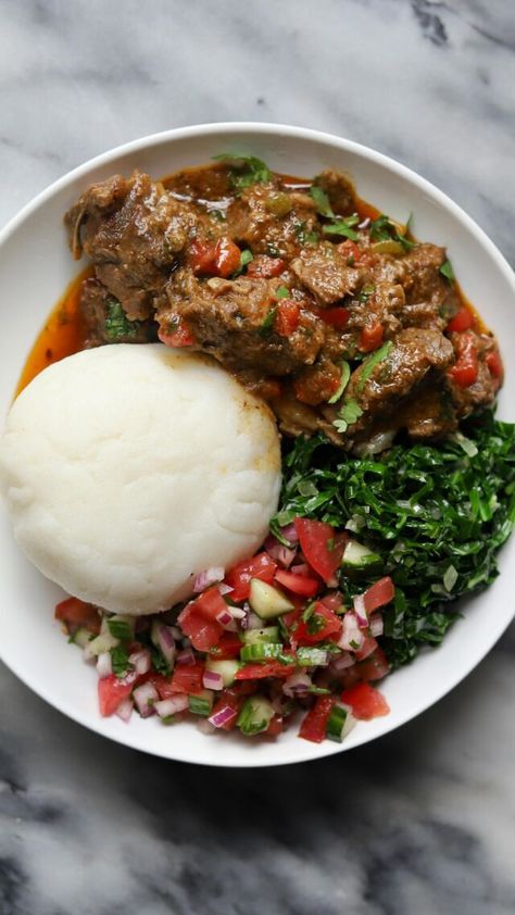 Kenyan Goat Wet Fry, Sukuma Wiki, Kachumbari and Ugali - Travelandmunchies Ugali Sukuma Wiki, Kenyan Recipes Dishes, Ugali Recipe, Kenyan Dishes, Sukuma Wiki, Kenyan Recipes, Suriname Recipes, Kenya Food, Filling Meals