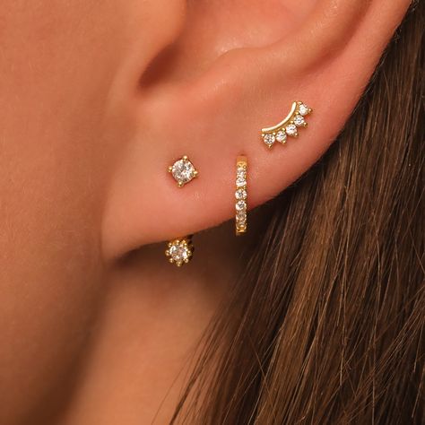 Dainty Earring Gift Set DETAILS: * Sterling Silver & 18K Gold Vermeil (strong plating over sterling silver) * A (front back) - length - 14mm * B (pave hoop) - inner diameter - 7mm * C (curved stud) - 6.5mm with butterfly backings * Nickel and lead free * Waterproof  * Tarnish resistant  * Hypoallergenic  * Lightweight * Can be worn 24/7 Each design sold in pair (2 earrings) All earrings: https://www.etsy.com/shop/KaterynasJewelry?search_query=earrings Several Ear Piercings, Styling 3 Ear Piercings, Earrings Gold Set, Dainty Ear Curation, Layered Piercings, Dainty Silver Earring Stack, Silver Earring Stacks, 3 Hole Ear Piercing Earrings, Dainty Earring Stack