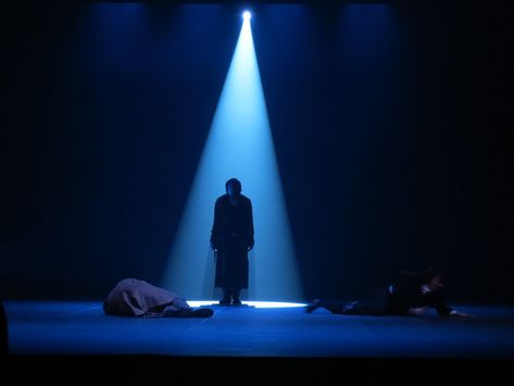 Act 3 Scene 2: I chose this lighting because the figure here is very much in the spotlight, but we still cannot see their face and we have no idea who they are. Much like, in this scene, Prior and Harper are talking to each other and almost remember who each other are--but can't. Theatre Stage Lighting, Green Stage Lighting, Neon Stage Design, Stage Lights Aesthetic, Theater Lighting Design, Stage Lighting Theater, Blue Stage Lighting, Spotlight Theatre, Lighting From Below