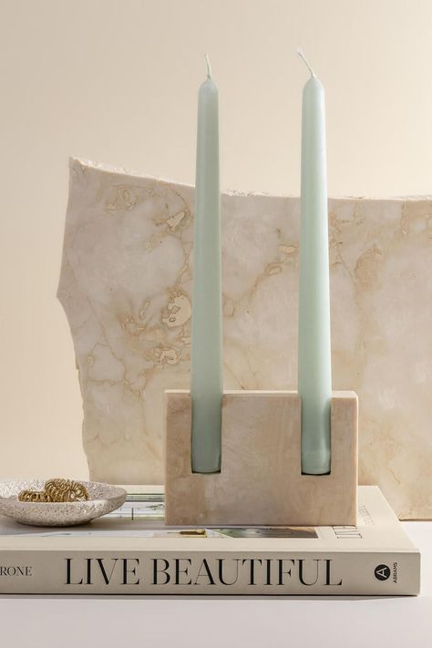 Simple yet stunning in its design, the Beysis travertine candle holder is a statement piece for any console or tabletop. Hand crafted from natural travertine with a honed finish, the holder accommodates two standard 22mm diameter taper candles. The natural variations in the stone make each candle holder distinctly unique. In a market flooded with trend-based designs, the Beysis travertine holder is a classic object destined to stand the test of time. *Candle sticks not included. *As this product Ceramic Wedding Gift, Dinner Party Settings, Stone Candle Holder, Home Decor Sites, Perfect Dinner Party, Candles Decor, Stone Candles, Candle Stick Holder, Modern Candle Holders