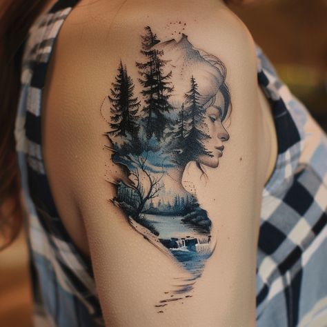 A beautiful synthesis of human and natural elements, the tattoo on the upper arm portrays a serene female profile seamlessly merging with a tranquil forest Back Cover Up Tattoos For Women Upper, Unique Upper Arm Tattoos For Women, Arm Tattoo Designs For Women, Upper Arm Tattoos For Women, Blue Tattoos, Natur Tattoo Arm, Shoulder And Arm Tattoo, Unique Half Sleeve Tattoos, Cover Up Tattoos For Women