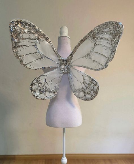 Ice Fairy Costume, White Fairy Wings, Butterfly Dresses, Fairy Wings Costume, Beneath The Stars, Halo Jewelry, Glow Stars, Moonrise Kingdom, Wing Jewelry