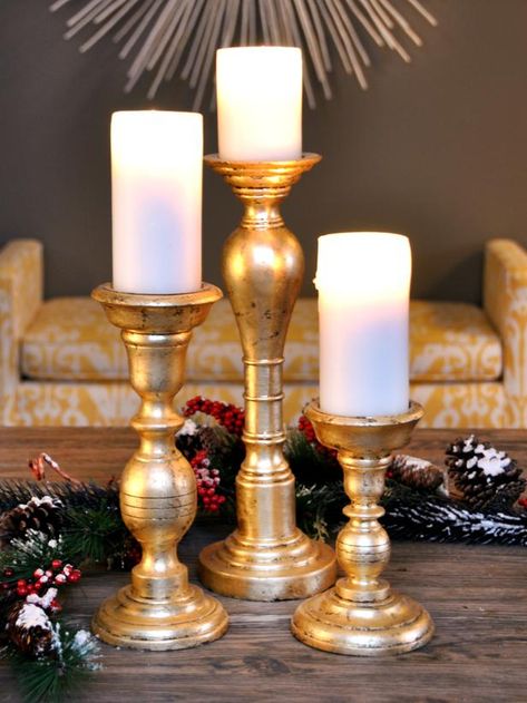 How to Make Gold-Leafed Holiday Candlesticks Christmas Candlesticks, Leaf Projects, Deco Table Noel, Gold Christmas Decorations, Wooden Candle Sticks, Wood Candle Sticks, Diy Christmas Decorations Easy, Navidad Diy, Gold Diy