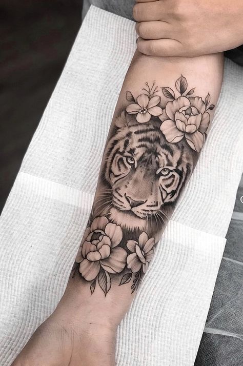 Tiger Face With Flowers Tattoo, Big Cat Tattoo Sleeve, Inside Calf Tattoo Women, Forearm Tattoo Women Tiger, Feminine Tiger Tattoo For Women Arm, Tiger And Flowers Tattoo Design, Girly Tiger Tattoo, Tiger Flower Tattoo Design, Tiger Calf Tattoo