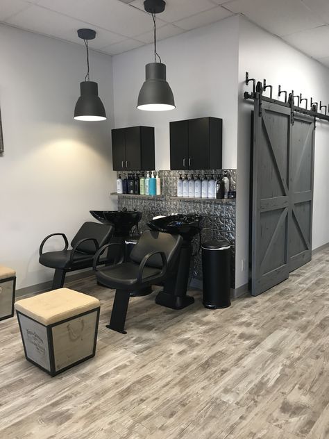 Backsplash &  Barn Doors Classy Salon Interior, Open Concept Salon Ideas, Back Bar Ideas Salon, Salon Backsplash Ideas, Black And White Salon Suite Ideas, Backbar Shelving Salon, Hair Salon Break Room Ideas, Grey Hair Salon Decor, Black And Wood Salon Decor