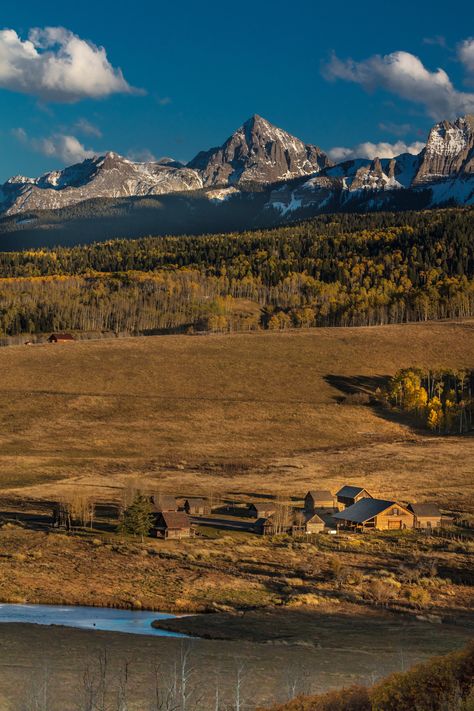 Snow peaked mountains and yellow field on Colorado Ranch. Ranch In Colorado, Denver Colorado Landscape, Colorado Western Aesthetic, Colorado Ranch Aesthetic, Canada Ranch Aesthetic, Montana Ranch Aesthetic, Colorado Ranch House, Ranch Life Aesthetic, Denver Colorado Aesthetic