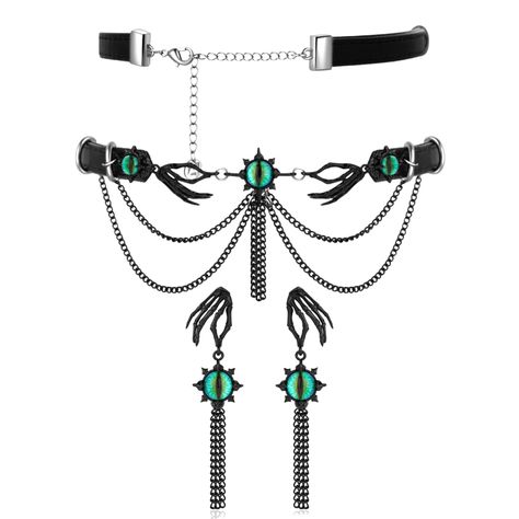 PRICES MAY VARY. Unique Design: This Halloween jewelry set fuses gothic and dark themed design elements, crafted specifically for fashion enthusiasts who seek individuality and uniqueness.The dazzling green eye at the center symbolizes mystery and power.The hand shaped decorations on both sides not only enhance the layered design but also create a mysterious yet elegant ambiance through intricate claw detailing. Hypoallergenic Jewelry Materials: This adorable eye-shaped jewelry set employs high Pendant Earrings Set, Jewelry Materials, Green Eye, Hypoallergenic Jewelry, Leaf Jewelry, Layered Design, Hand Shapes, Halloween Jewelry, Craft Time