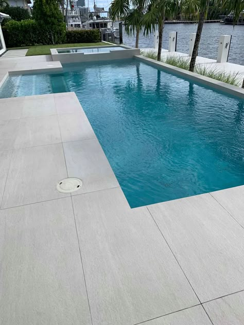 Pool Deck Stone Ideas, Pool Coping Ideas Modern, Pool Tiling Ideas, Pool Concrete Deck Ideas, Pool Handrail Ideas, Brushed Concrete Pool Deck, Brushed Concrete Patio, Modern Pool Tile Ideas, Modern Rectangle Pool