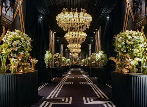 Celebrating 25 years of love and togetherness with a timeless elegance. 🌸✨ This stunning anniversary setup featured a sophisticated black theme adorned with cascading white florals and glimmering chandeliers. We brought their journey to life with a memory lane through the entryway, leading to a dining area bathed in the warm glow of candles and delicate floral arrangements. Every detail was thoughtfully curated to reflect their beautiful story, making this milestone truly unforgettable. . . ... Entry Arch, Arch Decor, Wedding Entrance Decor, Black Theme, Outdoor Indian Wedding, Wedding Entrance, Beautiful Story, White Florals, Wedding Decor Inspiration