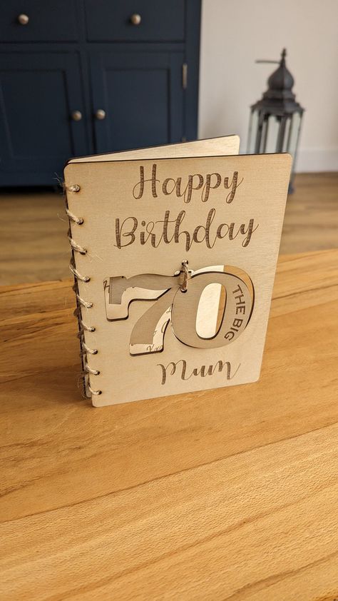 Engraved, Personalised Wooden 70th Birthday Card - Other styles & customisations are available. This wooden personalised engraved card makes a beautiful gift and keepsake that can be treasured forever.  With a floating 70 on the front, this card stands out from the rest. It can be engraved with any name and message you like. The card is laser cut & etched which offers a beautiful finish and great detail that will last a lifetime. We treat the wood with a Danish oil to protect and to bring out th Diy Laser Engraver, Diy Laser Cut, Laser Cut Box, 70th Birthday Card, Laser Cut Cards, Sticker Organization, Laser Cut Wood Crafts, Laser Engraved Gifts, Box Designs