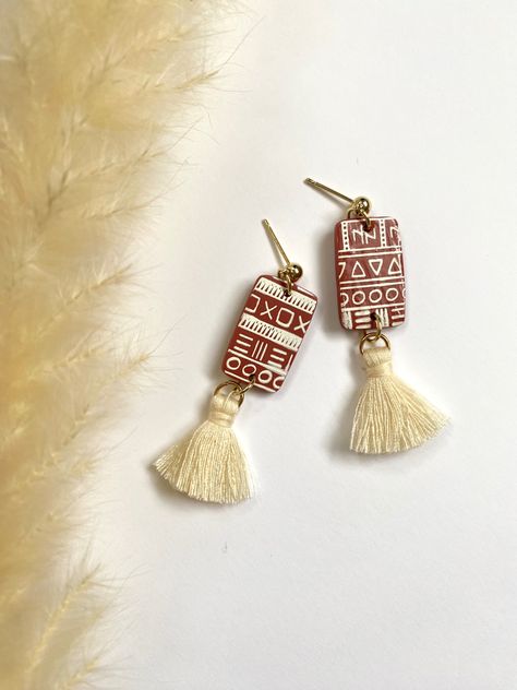 Boho Polymer Clay Earrings with Aztec print and cream cotton tassels Terracotta Polymer Clay Earrings, Bohemian Clay Earrings, Boho Clay Earrings, Aztec Clay, Terracotta Jewellery Making, Diy Earrings Easy, Terracotta Earrings, Terracotta Color, Diy Earrings Polymer Clay