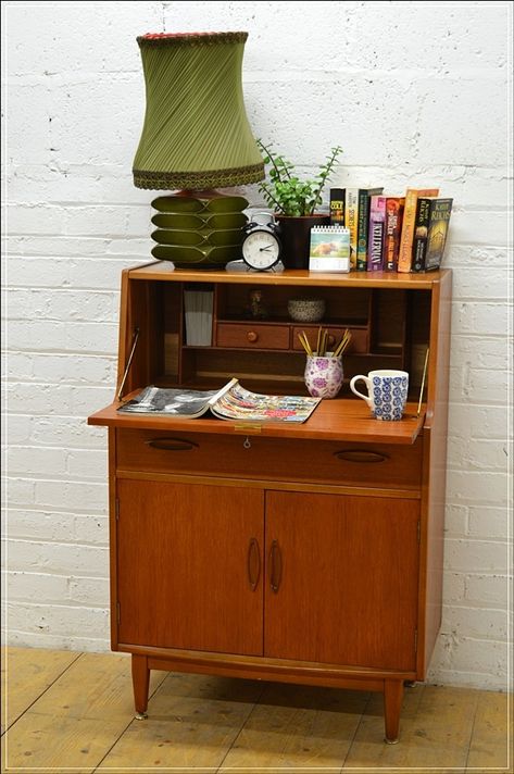 Mid century writing desk/bureau. Designed under danish influence and manufactured by Jentique Furniture. Please note, chair is for illustrative purposes only, NOT INCLUDED. Good vintage condition - sturdy and ready to be used. Please note - this piece is over 50 years old therefore you can notice some signs of wear (like scratches, marks, dents etc) - please carefully look on ALL photos. ... Mid Century Secretary Desk, Secretary Desk Bar, Mid Century Bureau, Mid Century Writing Desk, Bar Corner, Vintage Desks, Writing Bureau, Sales Desk, Secretary Desk