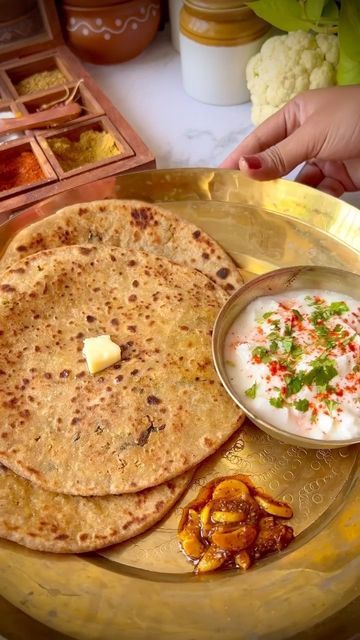 Foodklick on Instagram: "✨ Gobhi Paratha ✨ Gobi paratha is often made for breakfast in Punjabi homes as well as served in restaurants and Punjabi dhabas. We love to have them for breakfast and specially during winters as you get the best tender cauliflower in India during winters. I usually use fresh, raw, grated cauliflower straightaway in the stuffing instead of cooking it first. The paratha made with the raw, grated cauliflower mixture has a lovely taste, texture, flavor and are better tha Punjabi Breakfast, Gobi Paratha, Variety Food, Aloo Paratha, Flat Pan, Paratha Recipes, Indian Food Recipes Vegetarian, Recipes Vegetarian, Easy Healthy Breakfast