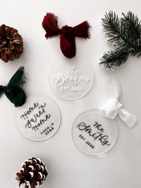 Thank you for Stopping By Signatures By Sidney! These Personalized Acrylic Ornaments will make for the perfect addition to your home this Christmas Season.  I carefully hand letter the on each tag with a permanent Paint Pen to ensure quality and durability. These are available in a variety of different color options as well as ribbon colors.  Each Ornament has a painted back unless you choose the color 'clear'.  Happy Holiday Shopping! Easy Cricut Gifts For Christmas, Unique Christmas Ornaments Cricut, Shop Small Christmas Graphic, Personalized Cricut Crafts, Unique Cricut Christmas Gifts, Cricut Projects Personalized, Personalize Christmas Ornaments, Custom Acrylic Christmas Ornaments, Diy Personalized Christmas Ornaments With Cricut