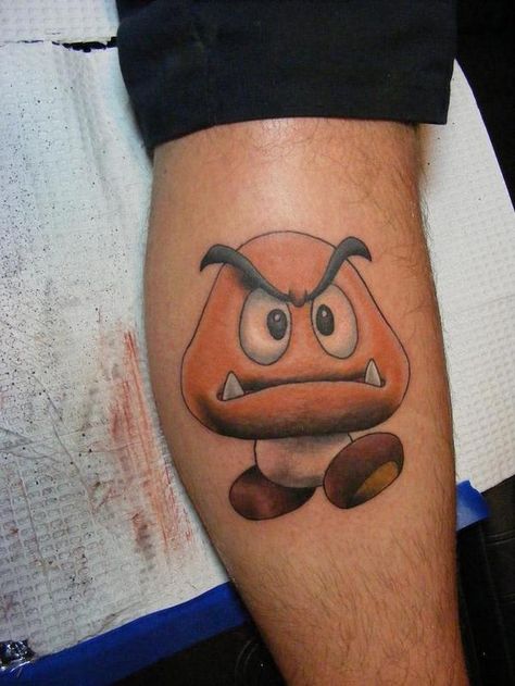 Goomba! Goomba Tattoo, Mario Goomba, Future Drawing, Game Tattoo, Mario Tattoo, Abstract Tattoo Ideas, Pisces Tattoos, Gaming Tattoo, Sleeve Ideas