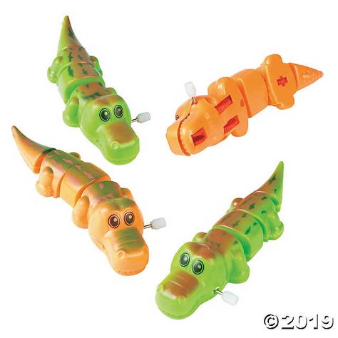 Wind these little guys up and watch them go! These prehistoric gators are a great party favor at your kids’ dinosaur theme birthday party! Hand them out ... Pirate Games For Kids, Gator Party, Alligator Birthday Parties, Crocodile Party, Swamp Party, Alligator Party, Dinosaur Theme Birthday, Alligator Birthday, Reptile Party