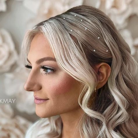 I Do Hair by Kimberly May LLC  Wedding/Event Hair - IL | WI on Instagram: "Tucked Back with Pearls, a fan fav.   What to ask for👇🏻  + Bangs left out with Light Framing + Sides Swept Back + Fluffy Waves + Pearls Pearls Pearls 🥰  Comment 🧜🏻‍♀️ for the Pearls!  🖤 Link in Bio * 2024/2025 Booking Inquiries * Rates * Discounts * Reviews  🖤 Save & Share with a friend needing inspo!  #idohairbykmay  #chicagoweddinghair  #chicagoweddinghairstylist  #lakegenevahairstylist  #weddinghairstylistchicago  #bridesmaidhair  #glamwaves  #longlastinghairstyle  #weddingtips  #weddinghairtips  #fluffywaves  #luxyhairpartner  #luxyhair  #halfuphalfdown #partypony #highupdo  #napervilleweddinghair #elginweddinghair #schaumburgweddinghair  #chicagosuburbsweddinghair" Slicked Hair With Pearls, Bride Hair With Pearls, Bridal Hair Down With Pearls, Hair Down With Pearls, Pearl Hairstyles Wedding, Wedding Hair With Pearls, Hairstyles With Pearls, Side Part Wedding Hair, Pearl Hairstyles