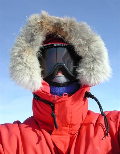 U.S. Antarctic Program participant dresses to withstand cold weather and low wind chills.  Participants are issued Extreme Cold Weather (ECW) gear in Punta Arenas, Chile, or Christchurch, New Zealand, before deploying to Antarctica.  It is then returned when they leave. Extreme Cold Weather, Penguins And Polar Bears, Punta Arenas, Christchurch New Zealand, Fur Hood Coat, Weather And Climate, Cold Weather Outfits, Christchurch, Photo Library