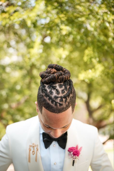 Fresh retwist with rope twist bun for a sophisticated groom Groom Locs Hairstyles, Formal Loc Styles For Men, Formal Dreadlock Hairstyles For Men, Men Wedding Loc Styles, Wedding Locs Hairstyles Men, Crown Dreadlock Styles, Men Dread Styles Updo, Prom Loc Hairstyles Men, Professional Dreadlock Hairstyles Men