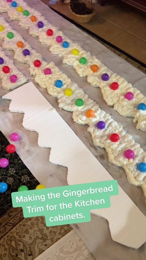 DIY Gingerbread trim for the kitchen cabinets! #christmas #DIY#gingerb... | TikTok Candyland Door Decorations Christmas, How To Make Gumdrop Decorations, Candyland Christmas Yard Decorations, Diy Gingerbread Centerpiece, Ginger Bread Diy Decor, Ginger Bread Party Decor, Gingerbread Theme Parade Float, Diy Gingerbread Kitchen Decorations, Gingerbread House Christmas Decorations Diy