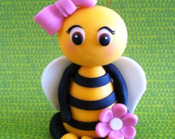 Items similar to BEE CAKE TOPPER: honey bee, bumble bee, first birthday, 1st birthday cake topper, Christmas ornament,decoration, personalized gift on Etsy Bee Cake Topper, Crea Fimo, Bee Cake, Bee Cakes, Fondant Animals, ดินปั้น Polymer Clay, Fondant Cake Toppers, Fondant Tutorial, Fondant Decorations