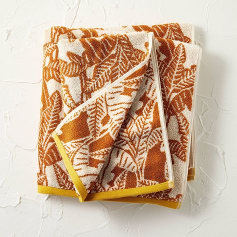 Make your bathroom feel more inviting with this 2-Pack Paradise Bath and Hand Towel Set from Opalhouse™ designed with Jungalow™. This set includes a bath towel and a hand towel, both crafted from 100% jacquard cotton fabric for a soft feel and plenty of absorbency. Featuring an allover print of leaves in a rust hue on a cream background, the towels are sure to bring eye-catching style to your bathroom decor. Meet Justina Blakeney of Jungalow, now partnering with Opalhouse to inspire lived-in spa Anthropologie Bath Towels, Boho Towels, Patterned Towels, Jungalow Decor, Bath Hooks, Bath Redo, Inspirational Board, Patterned Bath Towels, Print Comforter