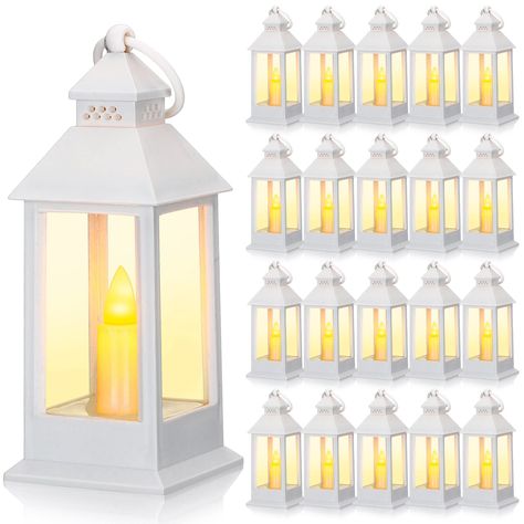 PRICES MAY VARY. Package Contents: you will get 24 pieces decorative lanterns for home decor, battery included; The interior is in the shape of candles, flameless and bright, allowing you to enjoy the ambiance of candlelight safely Cute Centerpieces: the candle lantern is lovely; Not only is it exquisite when hanging, but when you place it near a wall or simply set on the table, bright enough to illuminate your table in the dark, a beautiful table decor for your home Flickering Effect: the mini Led Candles Wedding, Lantern Decorations, Hanging Candle Lanterns, Lantern Decor Wedding, Mini Lanterns, Lantern Centerpieces, White Lanterns, Lantern Candle Decor, Small Lanterns