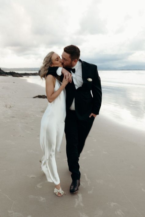 This couple booked a destination elopement in Byron Bay for an intimate ceremony and gorgeous candid elopement photos. Featuring a silk slip dress, gorgeous florals, and natural couples portraits - it's full of goodies! You can find more on my website and instagram xx Pre Wedding Praia, Beach Wedding Pics, Engagement Photo Shoot Beach, Sunset Beach Wedding, Sunset Beach Weddings, Byron Bay Australia, Beach Wedding Photos, Beach Wedding Photography, Beach Ceremony