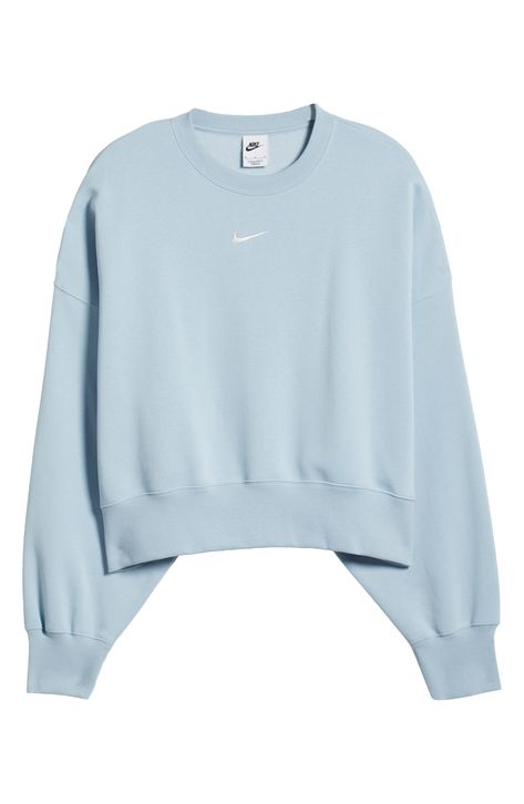 An embroidered Swoosh adds minimal branding to this cozy fleece sweatshirt cut for a relaxed, oversized fit that's enhanced by the dropped shoulders. 22" length (size Medium) Crewneck 80% cotton, 20% polyester Machine wash, tumble dry Imported Nike Phoenix Fleece, Nike Crewneck, Minimal Branding, Casual Preppy Outfits, Trendy Outfits For Teens, Cut Sweatshirts, Cute Preppy Outfits, Type S, Cute Sweatshirts