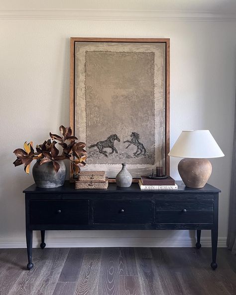 You guys - how stunning is my new piece of art by my talented friend @christiannetaylor ?! I'm trying to decide if it should go here or in my living room but I feel like it's absolutely perfect on this console table. I've linked everything else in my LTK. https://ltk.app.link/aBlyN1GZPMb #consoletabledecor #homedecor #ltkhome #interiordesign #oilpainting #afloral #oliveateliers Large Entryway Artwork, Large Mirror Console Table, Tv Console Traditional, Console Table Picture Wall, Moody Console Table Decor, Console Table With Art Above, Dresser As Console Table, Tv Console Wall Decor, Console Table Styling Dining Room