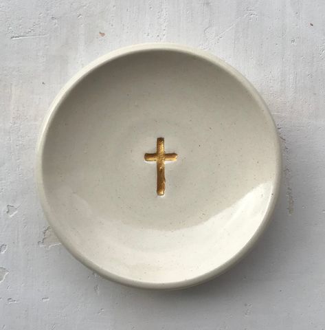 "The cross is engraved in the plate, it has a gold luster on top, can add names and dates. Perfect gift for weddings or baptism, communion or just a nice gift for any occasion. Makes a lovely rosary dish as well 100% handmade in my art studio :)  it's ceramic white very good quality with a clear glass glaze on top. Approximately 3.-3.5\"in diameter. Happy to make a samples for custom orders/personalized plates 🌸 For larger special orders the turnaround production time is 7days :) Message me for Ceramic Crosses, Engraved Cross, Ceramic Incense Holder, Gold Ceramic, Ceramic Rings, Clay Art Projects, Gold Engraving, Pottery Plates, Cross Jewelry