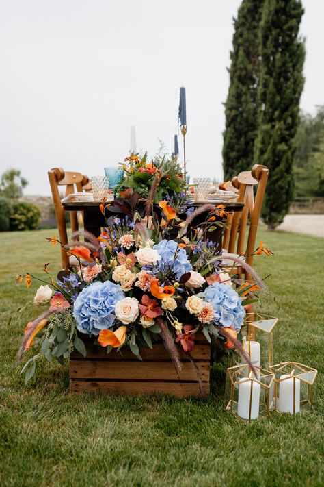 Sunset Color Flower Arrangements, Steel Blue And Orange Wedding, Peach And Blue Wedding Theme, Unique Fall Wedding Ideas, Dusty Blue And Terracotta Wedding, Orange Blue Wedding, French Blue Bridesmaid Dress, Blue Orange Weddings, October Wedding Colors