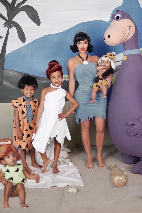 100+ Best Celebrity Halloween Costumes of All Time - Hollywood Costume Ideas Flintstones Halloween Costumes, Flintstones Costume, Look Disco, Dino Costume, Best Celebrity Halloween Costumes, Themed Halloween Costumes, Rock Family, Kardashian Kids, Celebrity Halloween Costumes