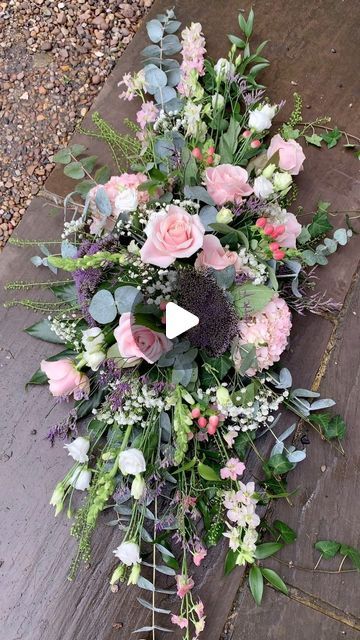 Simply Flowers on Instagram: "Crafting heartfelt tributes at our flower shop!  Watch us create a stunning country-style double-ended funeral spray with Sweet Avalanche roses, pink hydrangea, larkspur, trachelium, gypsophila, white eustoma, and snapdragons. Delicate pastel hues harmonize with lush eucalyptus, ivy, soft ruscus, aralia and thlaspi for a serene touch.   Each arrangement is a unique expression of sympathy and remembrance. Honouring the beauty of life and the warmth of memories.   #FloralTribute #SympathyArrangement #CountryStyleFlowers" Flower Arrangement With Eucalyptus, Stunning Flower Arrangements, Sympathy Flower Arrangements, Soft Ruscus, White Eustoma, Country Flower Arrangements, Red Flower Arrangements, Floral Centrepiece, Pink Flower Arrangements