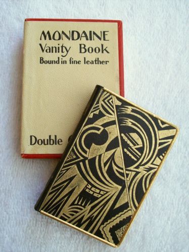 Art DECO Mondaine BOOK VANITY Compact Antique 1920's Pre-1930  http://www.ebay.co.uk/itm/RaRe-Art-DECO-Mondaine-BOOK-VANITY-Compact-Antique-20s-Flapper-Case-Vintage-/141248491573?roken=cUgayN Art Deco Jewellery Design, Art Deco Graphics, Compact Art, Art Deco Vanity, Modern Deco, Leather Bound Books, Art Deco Patterns, Historical Art, Vintage Vanity