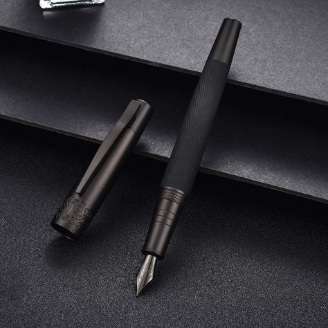 PRICES MAY VARY. ✅ High Quality -- This general fountain pen features durable brass barrels and cap, premium brushed matte finishes, and polished accents that render pure sophistication. ✅ Classic Style -- Well-designed, carefully-crafted, mysterious black colored metal fountain pen. ✅ Smoothly Writing -- It is equipped with a PVD coated black steel fine nib to deliver an incomparable writing experience. ✅ Well-Balanced -- The weight of pen is carefully calculated and much more suitable for long Tree Textures, Amazon Purchases, Color Pen, Luxury Pens, Pure Black, Bottled Ink, Ink Toner, Ink Refill, Colored Pens